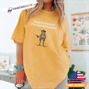 Hold On Partner Im Overstimulated Cowboy Frog Comfort Colors Tee 1